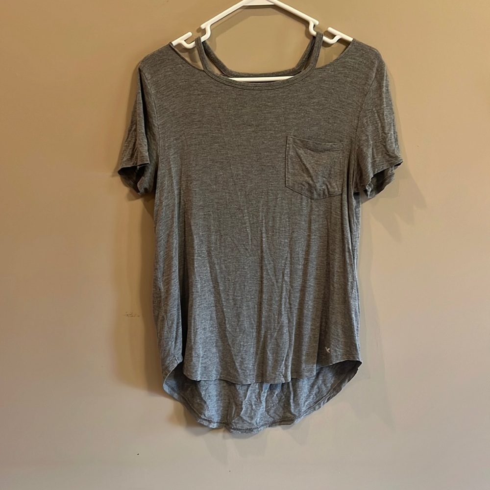 Super soft gray shortsleeve with cutout and front pocket from Hollister